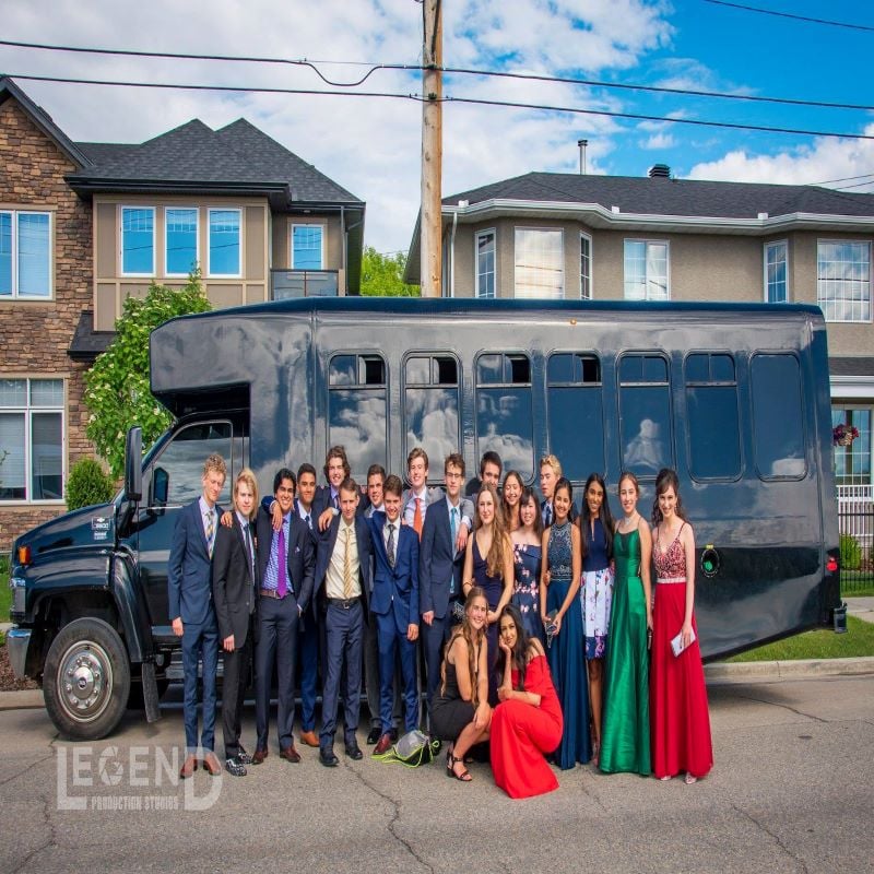 Graduation celebration in fron of E450 Party Bus