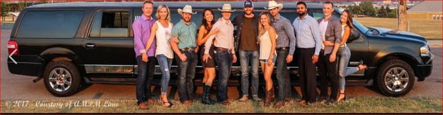 Group celebrating the Calgary Stampede with black stretch limousine