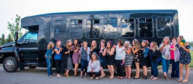 Stagette party photo outside of black party bus